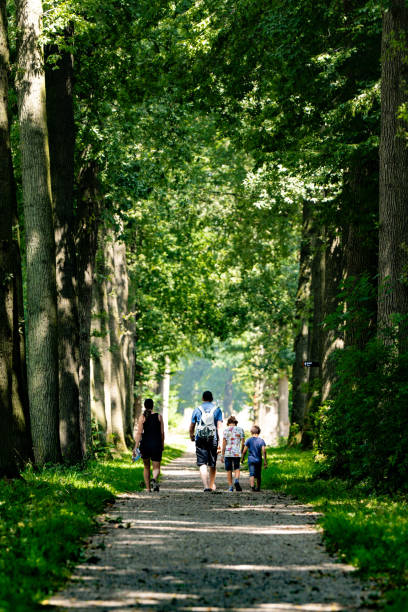 istock Mother, father and children 1630738822