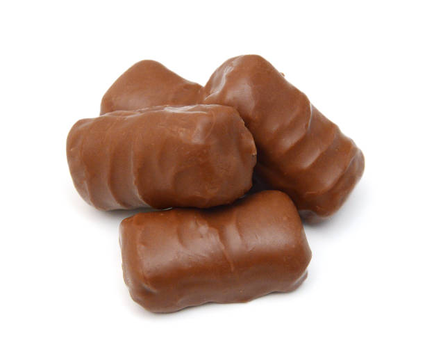 istock Chocolate candies collection. Beautiful Belgian truffles isolated on white background 1630738979