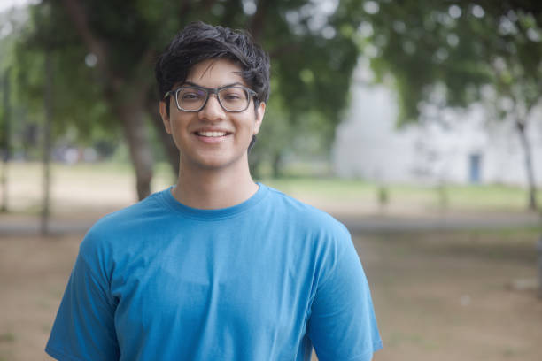 istock Portrait of a young Indian college student looking at camera 1630774329