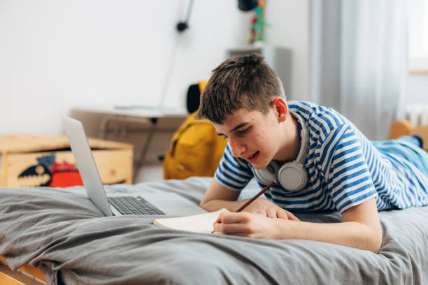 istock teenager boy in his room 1630781362
