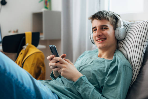 istock teenager boy in his room 1630781919
