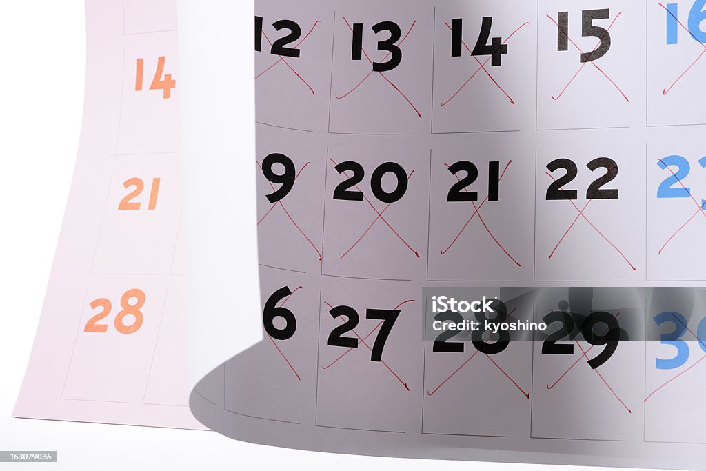 クローズアップのカレンダーから開いたページを白背景 - カラー画像のロイヤリティフリーストックフォト