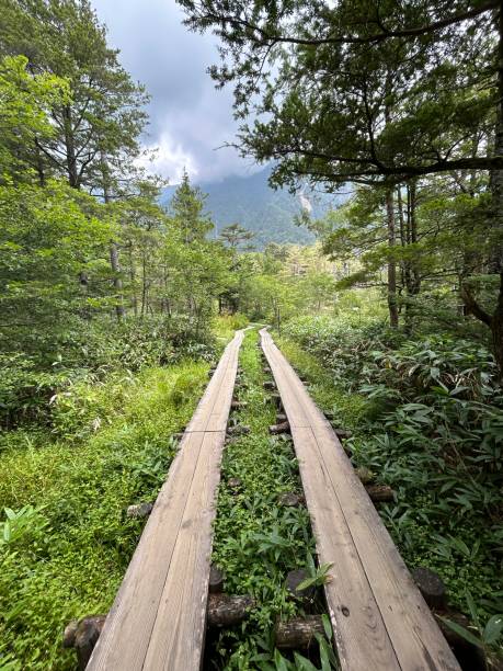 istock Kamikochi (Upper Highlands) is a remote mountainous highland valley within the Hida Mountains range, in the western region of Nagano Prefecture, Japan. Japanese hiking and trekking. 1630794793