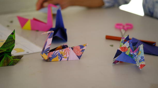 istock Japanese Swan paper origami workshop with colorfull paper pattern. 1630821027