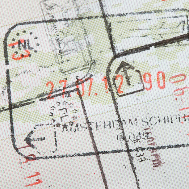 istock Immigration stamps on passport page 163083857