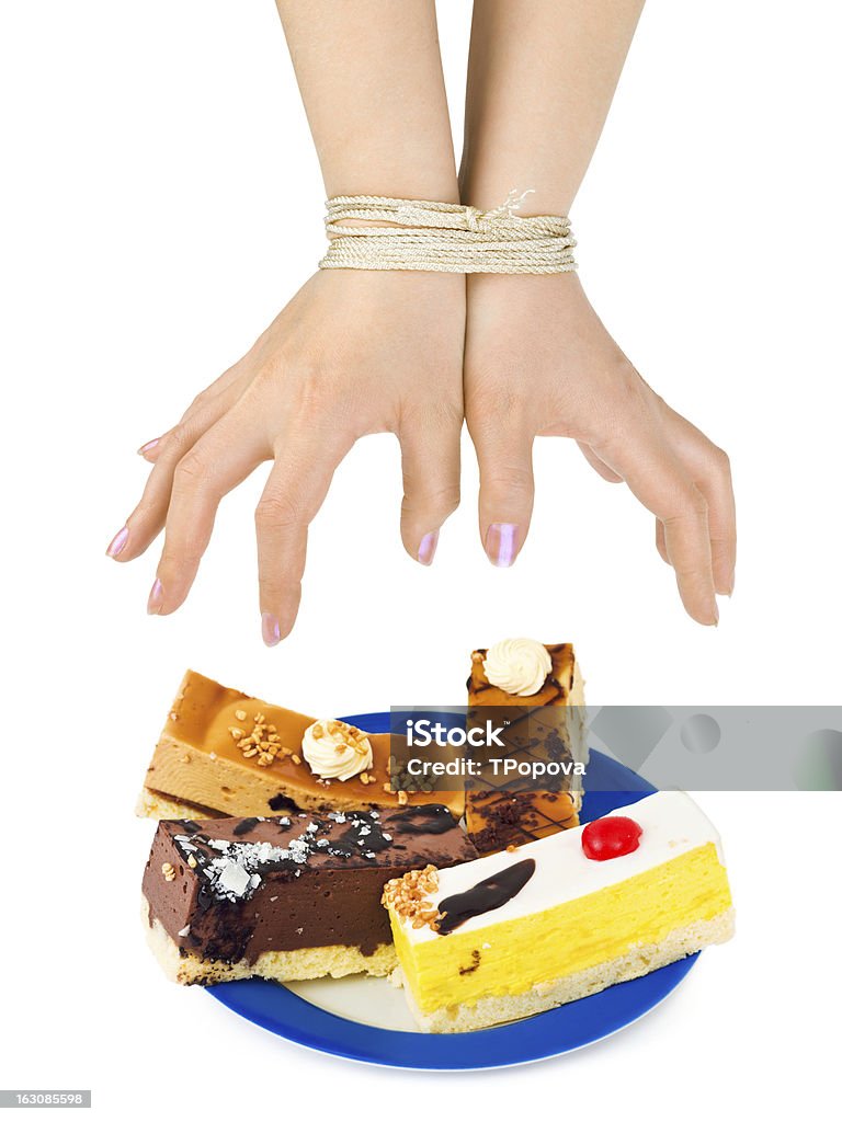 Torte e vincolati mani - Foto stock royalty-free di Alimentazione non salutare