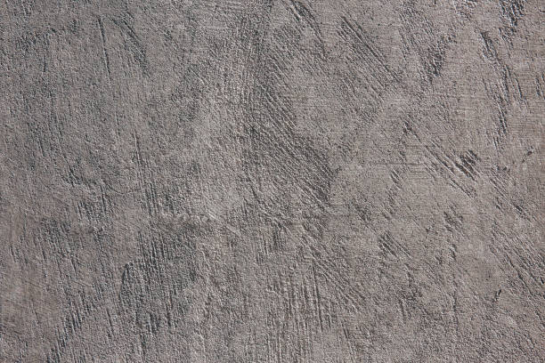istock The background stucco rough surface. Top view, toning. Background or texture for design 1630890275