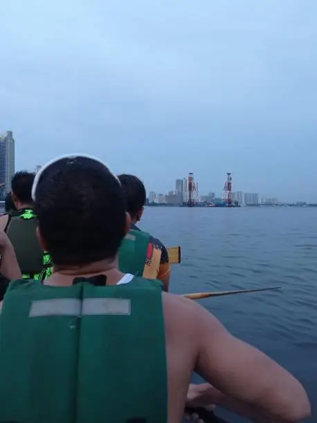 Dragon boat training with team Onslaught Racing Dragon in Manila bay Philippines