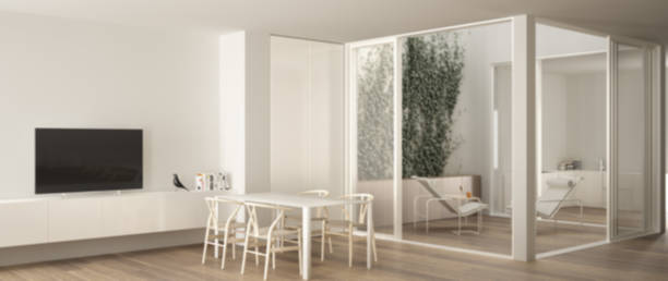 istock Blur background interior design, minimalist living room with dining table, big windows on balcony terrace with lounge armchair and kitchen in the background, contemporary modern 1630953926