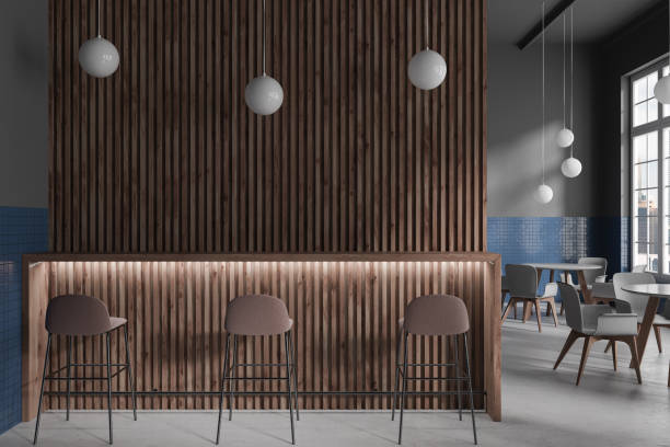 istock Gray and wooden cafe interior with bar counter 1630967832