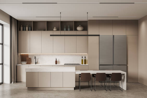 istock Beige kitchen interior with bar and fridge 1630972133