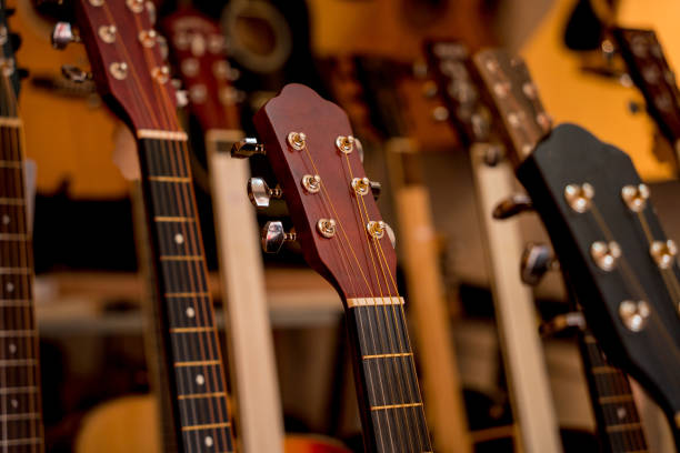 istock Many rows of classical guitars in the music shop 1630988962