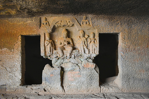 A View of Lower unfinished Vihara, Intrusive Buddha panel and Cells for the Monks, Karla Caves, these Caves was constructed between 50 and 70 CE, and 120 CE, located near the Karla, Lonavala in Pune Dist. Maharashtra, India.