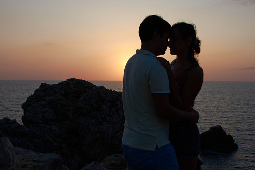 Silhouette of a couple at sunset