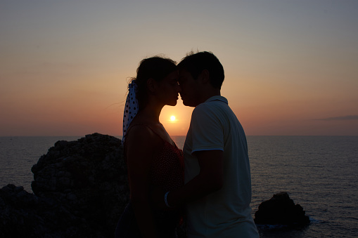 Silhouette of a couple at sunset