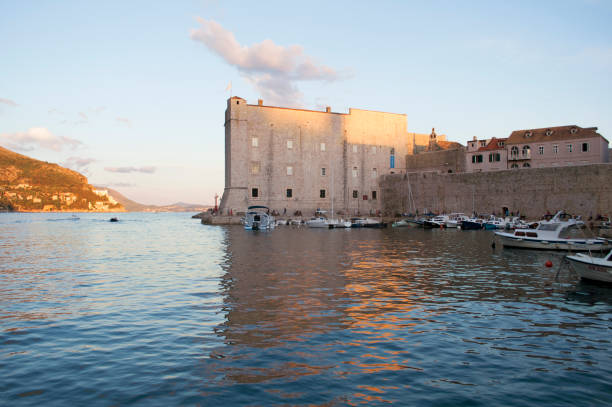 istock Boats in Dubrovnik Harbour at the Sunset 1631064444