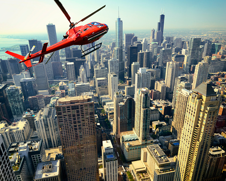 Helicopter flying over Downtown Chicago Illinois USA. Toned Image.