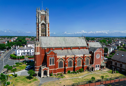 Southport, Lancashire, UK, June 21, 2023; aerial view of the historical Holy Trinity church with a tall tower in Southport, England, UK