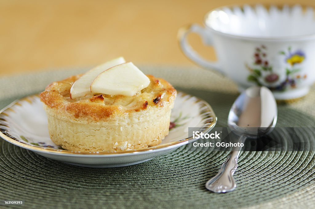 Almond pastry with apple slices Almond pastry with apple slices on a white plate. Almond Stock Photo