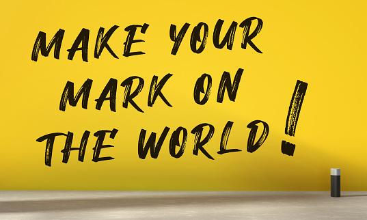 Make Your Mark On The World Written Yellow Wall. Idea And Message Concept.