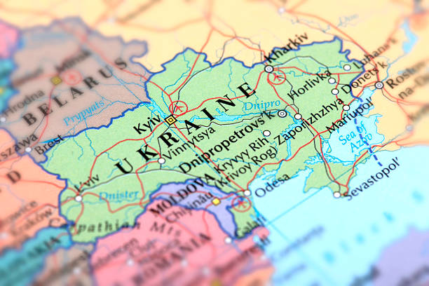 Map of green Ukraine on a globe stock photo