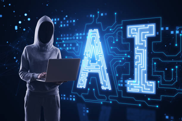 Hacker in hoodie using laptop with glowing digital polygonal AI hologram on dark background. Artificial intelligence, metaverse and technology concept. stock photo