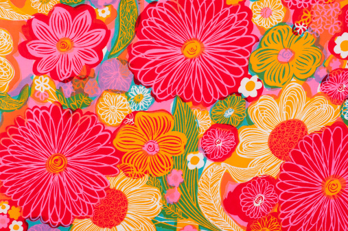 Vintage pink, yellow, orange, blue and green flowered fabric circa 1962 to 1972.