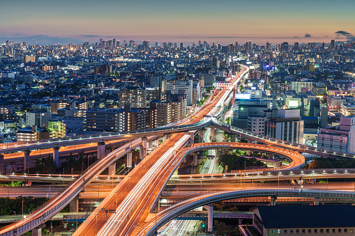 East Osaka, Japan with junctions and highways at dusk.