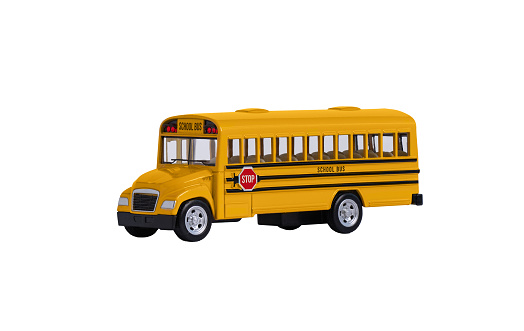 Toy american school bus isolated on a white background. Model of school bus for design.