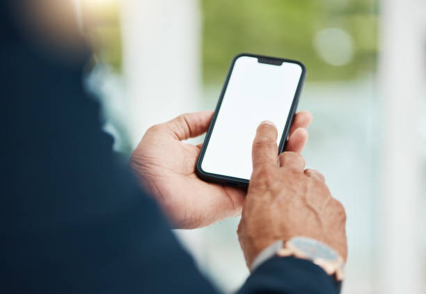 istock Mockup cellphone screen, hands and person communication, graphic or typing mobile app search, review or feedback. Smartphone software upgrade, closeup and agent email, agenda or scroll on UI space 1631195781