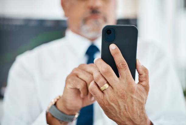 istock Networking cellphone, hands and business man typing, scroll or search online database, texting or contact user. Closeup smartphone connection, application and professional person check research info 1631196369