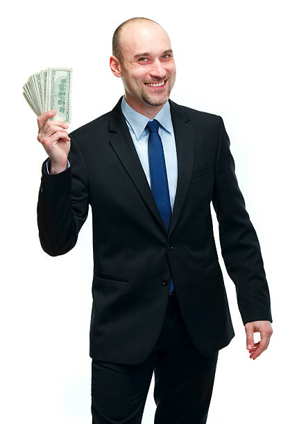 istock Businessman holding dollar bills 163120941