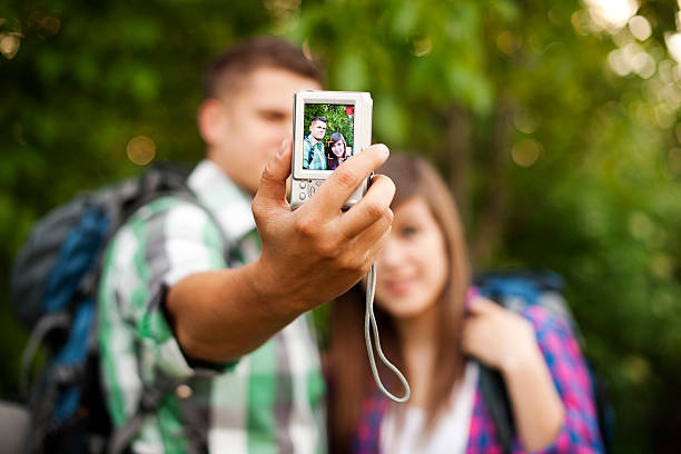 istock Couple on a hike taking a selfie 163124248