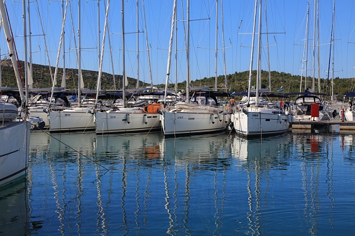 Sailboats moored in Pirovac Marina. Croatia is a famous summer sailing destination in Europe.