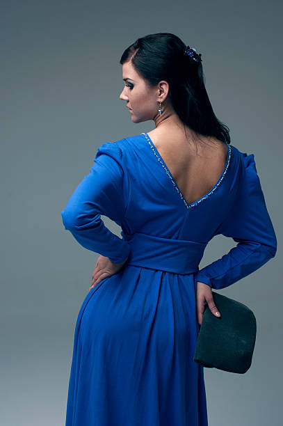 istock girl in a blue evening dress 163125801