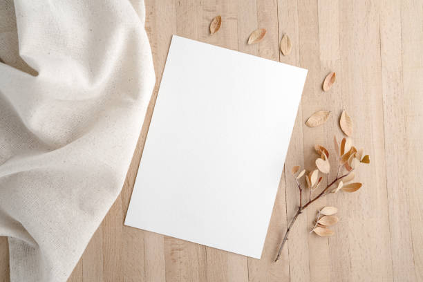 istock Empty Wedding invitation mockup on wood background 1631277531