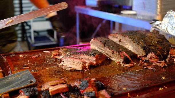 istock BBQ Lamb meat that is being cut on chopping board. 1631298020