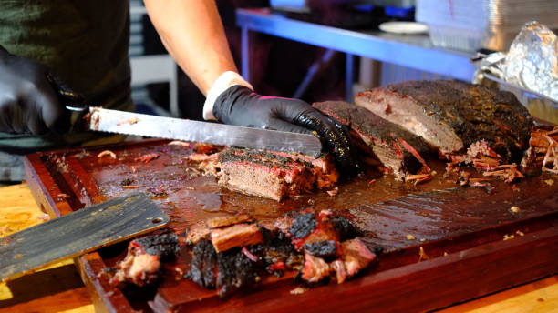 istock BBQ Lamb meat that is being cut on chopping board. 1631312092