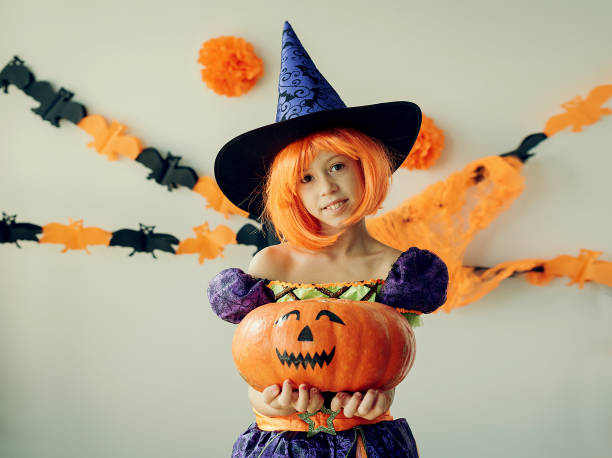 istock kid enjoying a Halloween party 1631356209