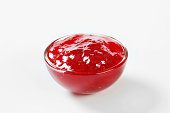 Strawberry jam in a glass bowl