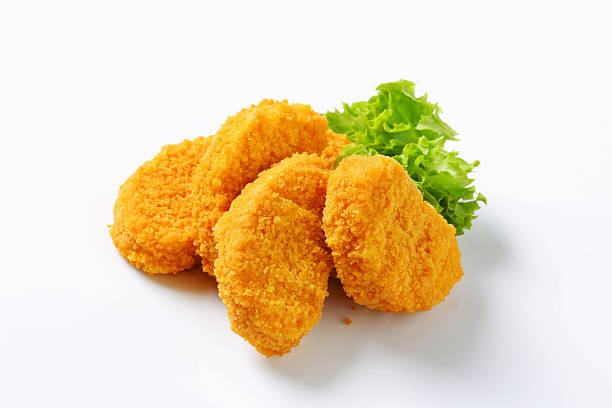 Vegetarian nuggets Vegetarian nuggets isolated on white nuggets heat stock pictures, royalty-free photos & images