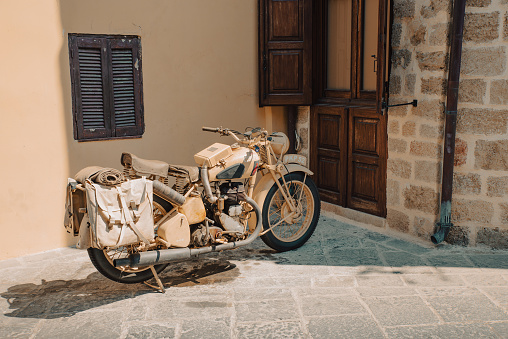 Rhodes, Greece - September 7, 2018: Old and vintage motorbike parked in Rhodes, Greece