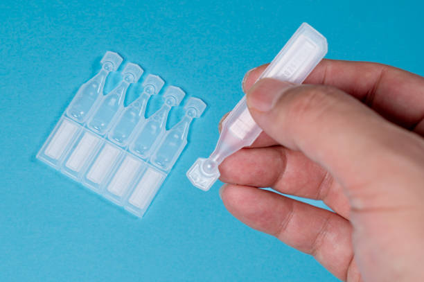 istock Disposable eye drops isolated on blue background 1631429797