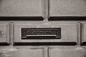 Italian vintage letterbox in Florence, sepia toned