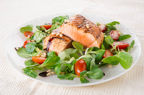 istock Rare fried salmon steaks in plate 163145355