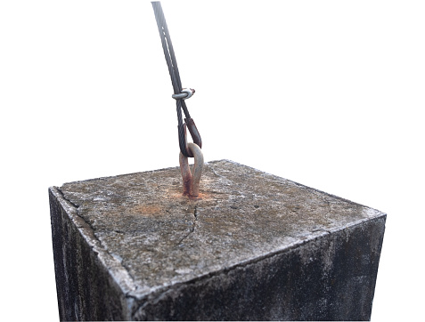 The wire rope is attached to the cement base. isolated on white background ,Clipping path