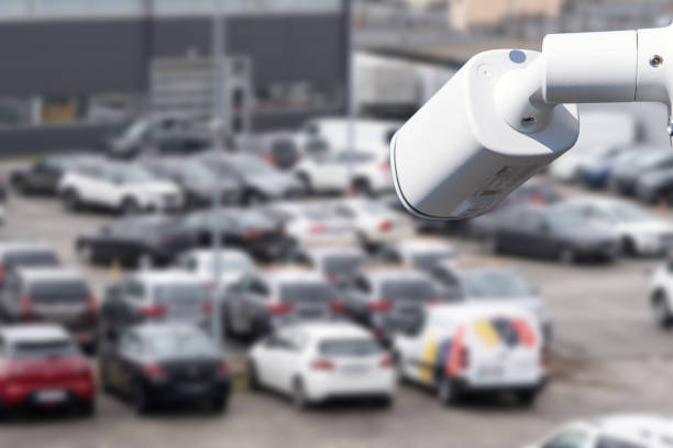 istock Video surveillance camera installed on a vehicle parking. 1631469095