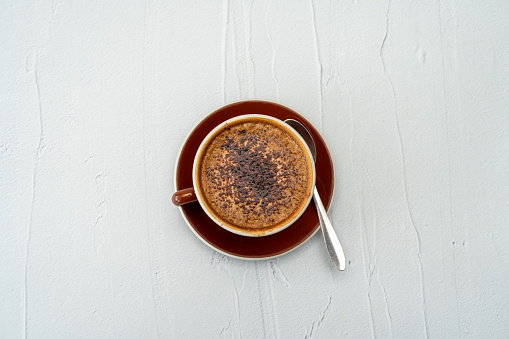 coffee cup on a light grey background