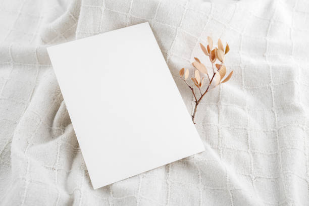 istock Empty Wedding invitation mockup on linen fabric background 1631490037