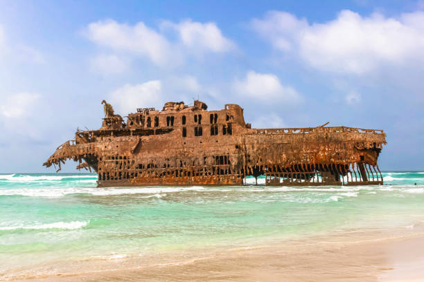 istock rusty and abandoned boat on the beach 1631510047
